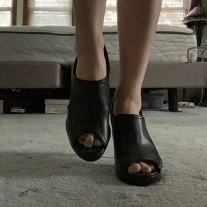 Woman’s Black Heel